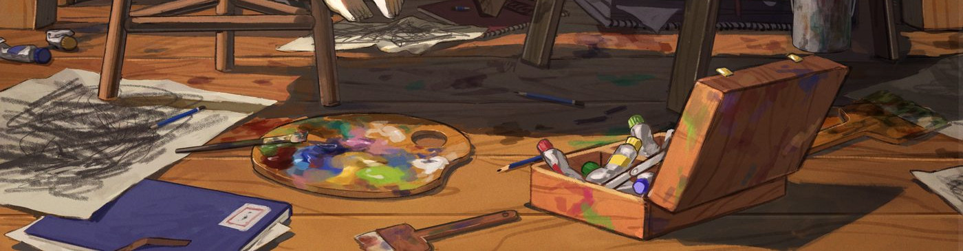 絵の具とパレット、スケッチブックが並ぶアトリエの床